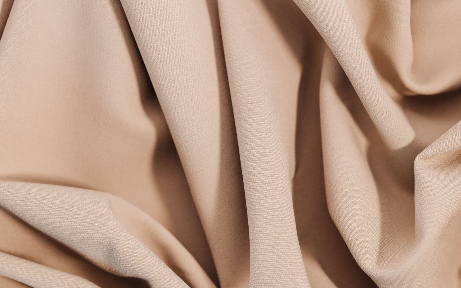 Soft neutral fabric with a luxurious drape